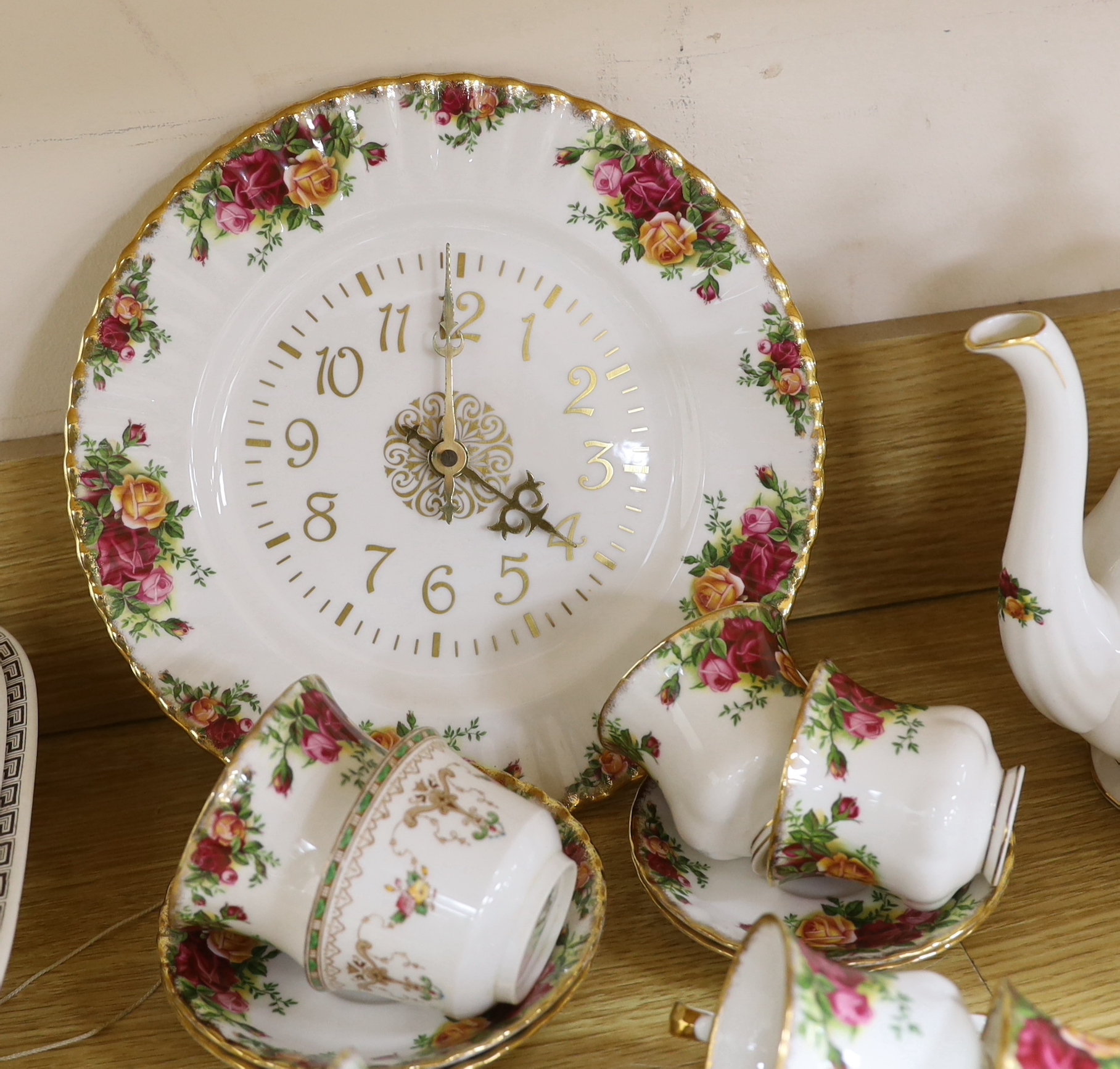 A Royal Albert Old Country Rose dinner service and tea service including trios, tureens and oval dishes